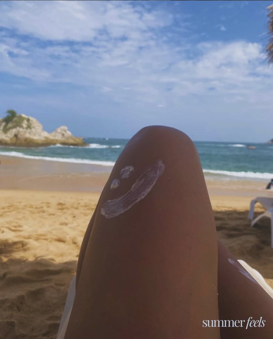 Sunshine and a smile drawn in sunscreen